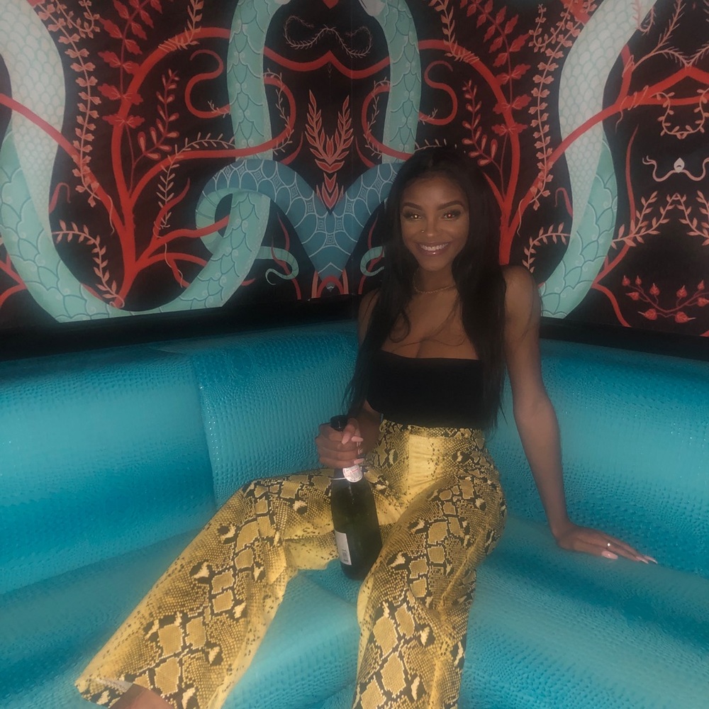 Snake skin high waist pants.